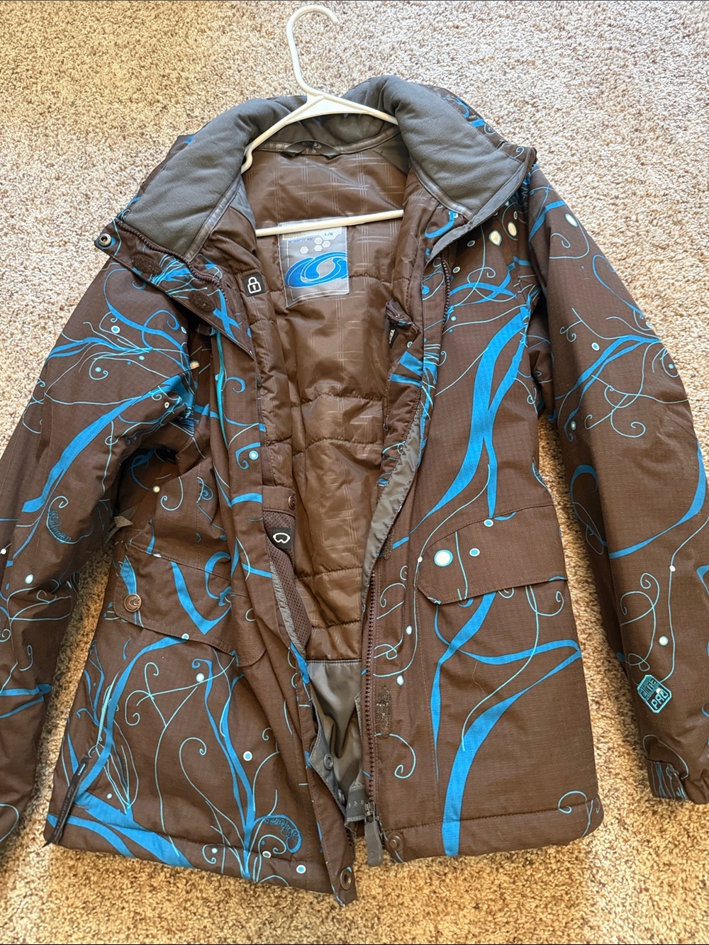 Salomon Brown Jacket with Blue Swirl Pattern